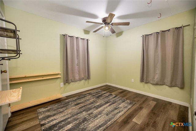 2102 Leon Dr, Port Lavaca, TX 77979 - unfurnished bedroom featuring wood finished floors and a ceiling fan