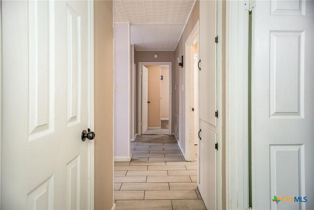 2102 Leon Dr, Port Lavaca, TX 77979 - corridor featuring wood finish floors and baseboards