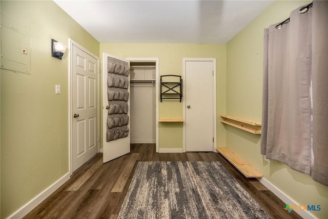 2102 Leon Dr, Port Lavaca, TX 77979 - unfurnished bedroom with wood finished floors and baseboards