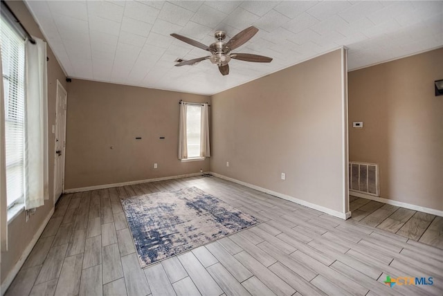 2102 Leon Dr, Port Lavaca, TX 77979 - unfurnished room with ceiling fan and wood finished floors