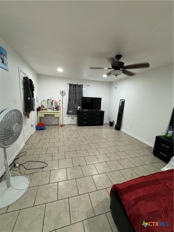 living room with light tile patterned flooring and ceiling fan