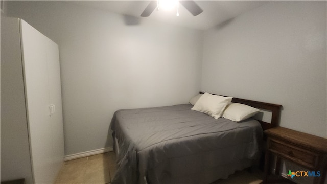 bedroom featuring ceiling fan