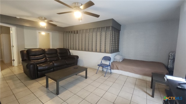 tiled bedroom with ceiling fan