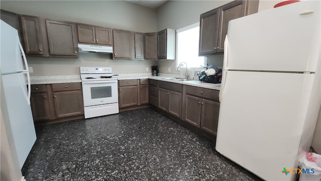 kitchen with white appliances and sink