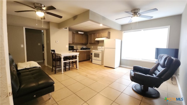 living room with ceiling fan and light tile patterned floors