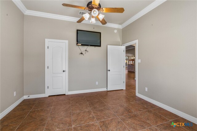 unfurnished bedroom with ceiling fan, baseboards, and ornamental molding