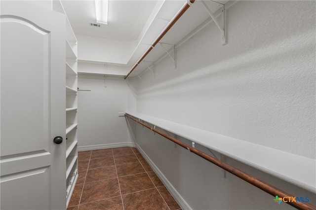 walk in closet featuring visible vents