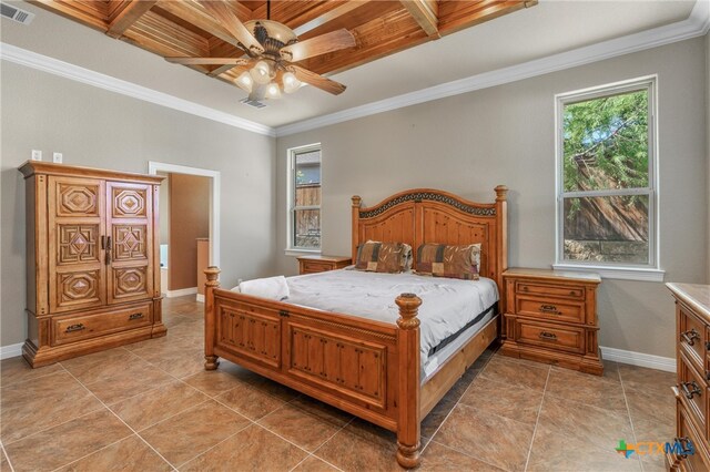 bedroom with baseboards, visible vents, and ornamental molding