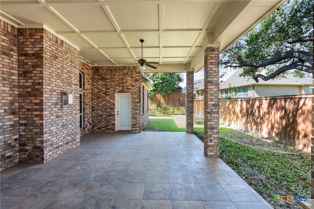 view of patio featuring a ceiling fan and a fenced backyard