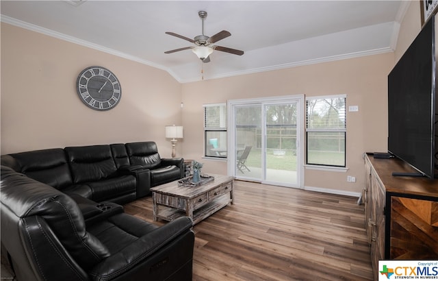 living room featuring ornamental molding, hardwood / wood-style flooring, and ceiling fan