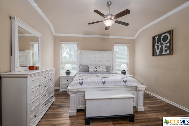 bedroom featuring dark hardwood / wood-style flooring, multiple windows, and ceiling fan