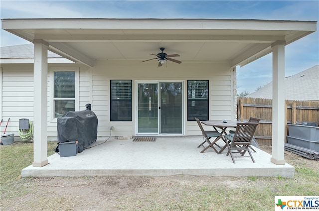 view of patio featuring a grill and ceiling fan