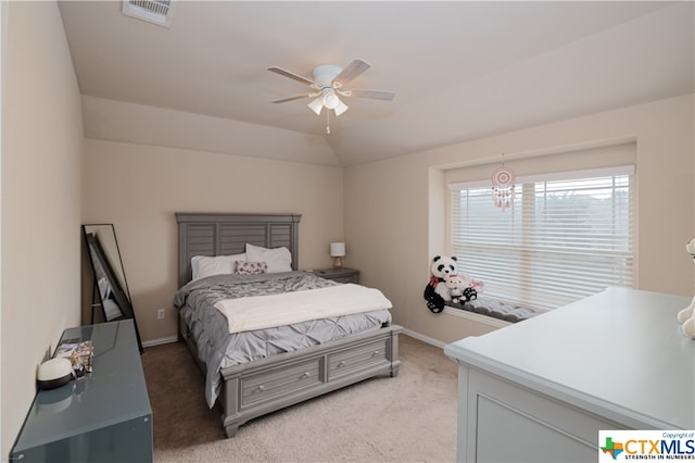 carpeted bedroom with lofted ceiling and ceiling fan