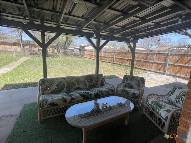 view of patio with a fenced backyard and outdoor lounge area