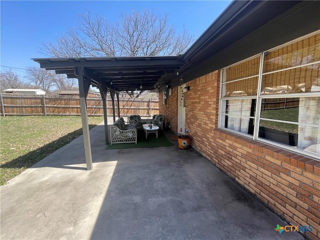 view of vehicle parking featuring a carport and fence