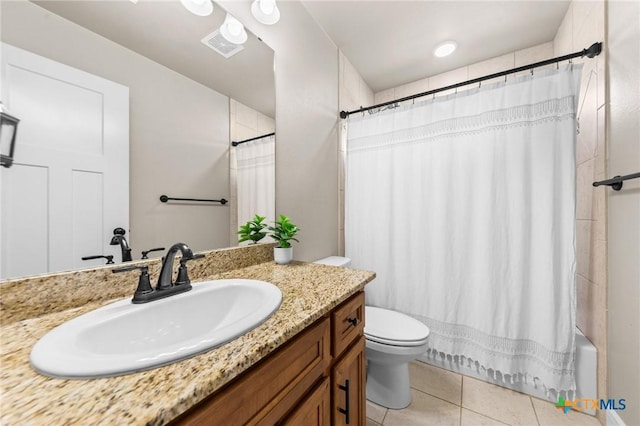 full bath with tile patterned floors, toilet, visible vents, shower / tub combo, and vanity