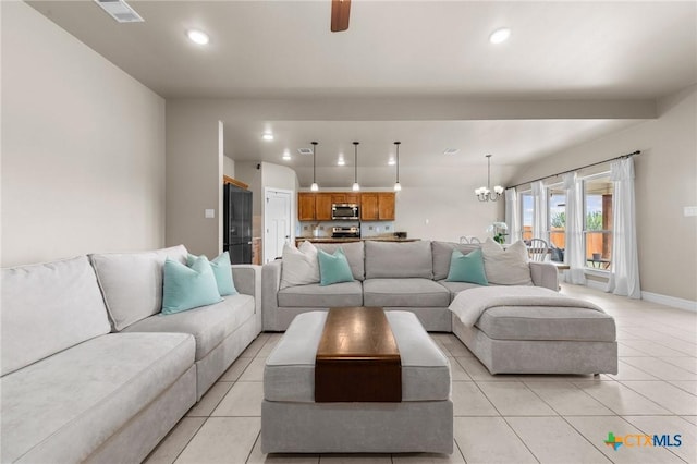 living room with baseboards, visible vents, recessed lighting, and light tile patterned flooring