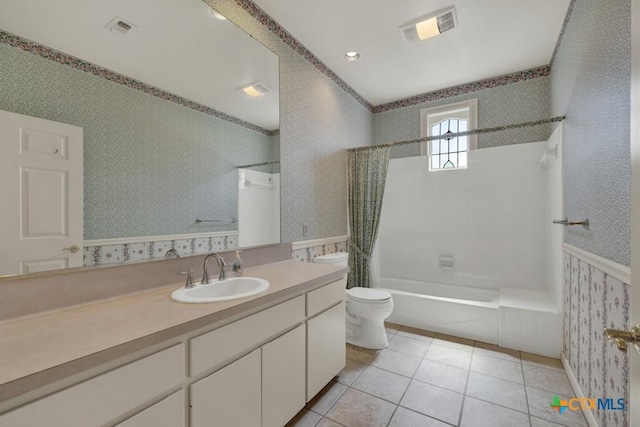 82 Bell Mountain Rd, Fredericksburg, TX 78675 - bathroom featuring wallpapered walls, toilet, vanity, shower / washtub combination, and tile patterned flooring