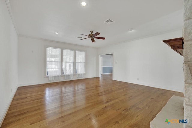 82 Bell Mountain Rd, Fredericksburg, TX 78675 - unfurnished living room with crown molding, a ceiling fan, wood finished floors, baseboards, and recessed lighting