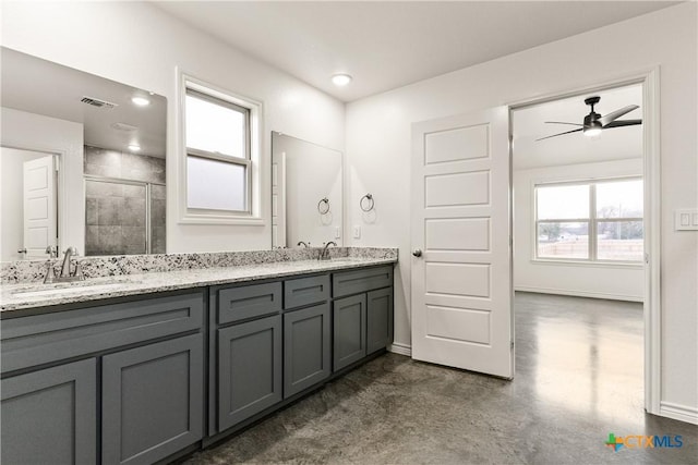 bathroom with vanity, concrete flooring, and walk in shower