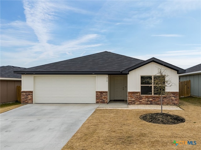 ranch-style house featuring a garage