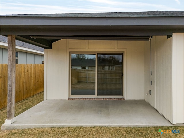 doorway to property with a patio area