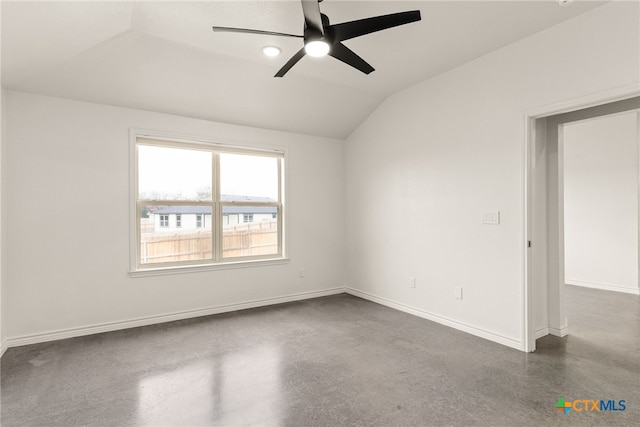 unfurnished room with vaulted ceiling and ceiling fan