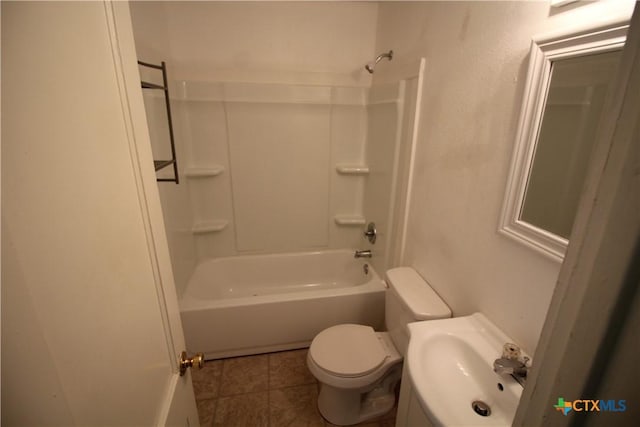 full bathroom with toilet, washtub / shower combination, and sink