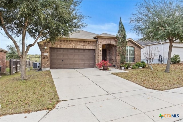 single story home featuring a front lawn, a garage, and central AC unit