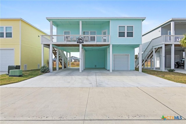 coastal home with a carport and central air condition unit