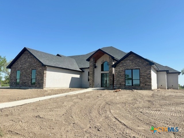 view of front of house featuring stone siding