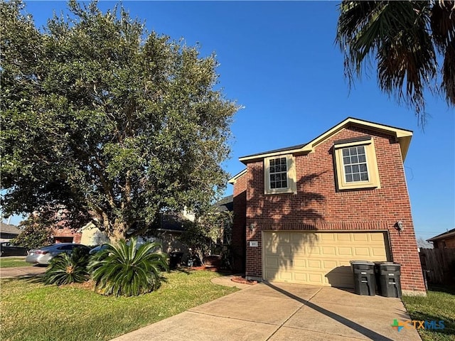 view of front of home with a garage and a front lawn