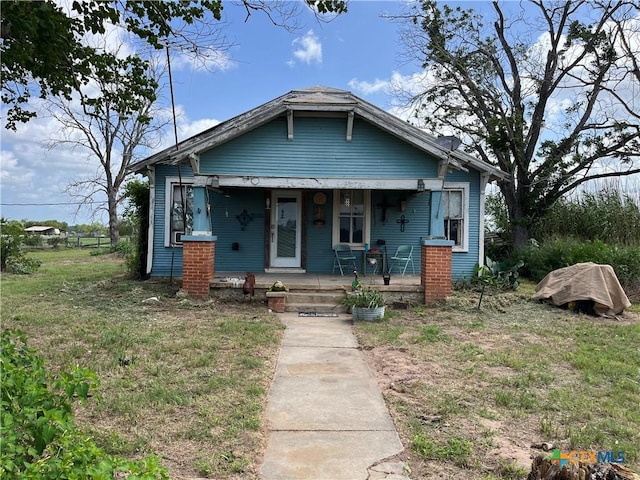 bungalow-style house featuring covered porch