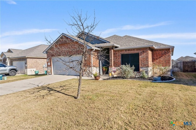 view of front facade with a garage and a front lawn