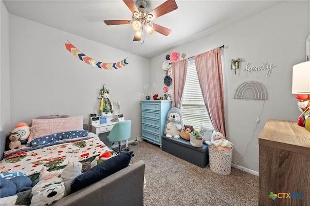 bedroom featuring ceiling fan and light carpet