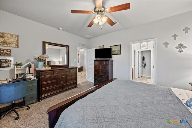 carpeted bedroom featuring ceiling fan