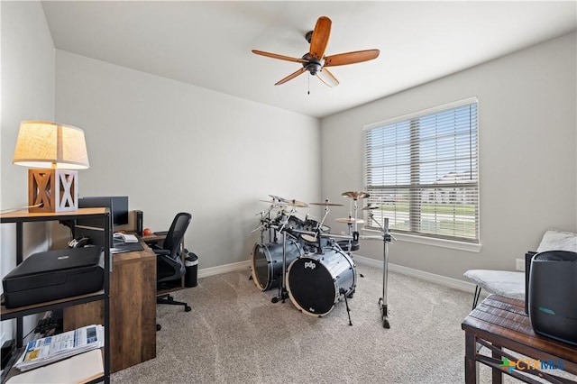 office area featuring ceiling fan and light carpet