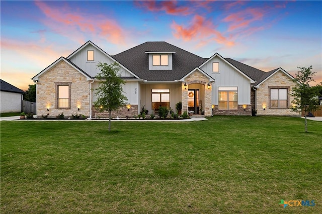 view of front of house with a lawn