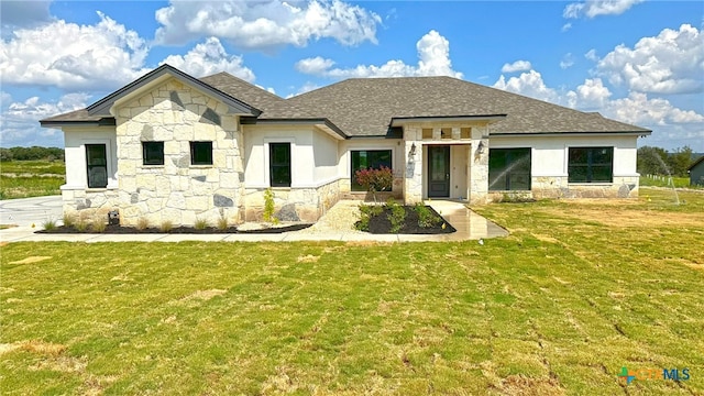 view of front of house with a front lawn