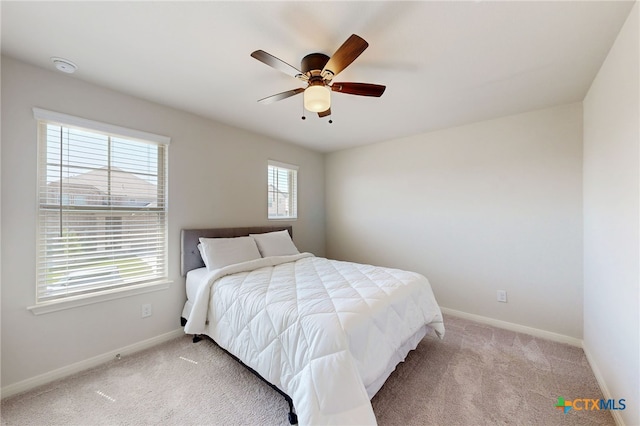 10259 Juniper Oaks, Boerne, TX 78006 - bedroom with light colored carpet and a ceiling fan