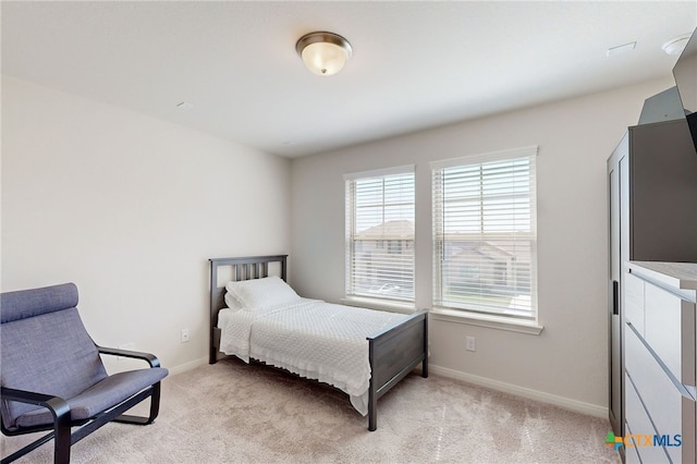 10259 Juniper Oaks, Boerne, TX 78006 - bedroom with light carpet and baseboards