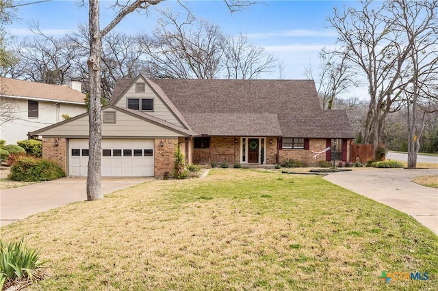 view of front of home with an attached garage, brick siding, concrete driveway, roof with shingles, and a front lawn