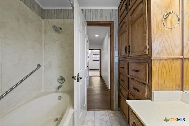 full bath with tile patterned flooring and bathing tub / shower combination