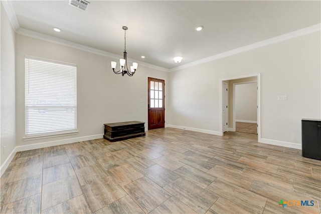 1040 Vista Dr, Salado, TX 76571 - spare room featuring light wood finished floors, baseboards, visible vents, a notable chandelier, and crown molding