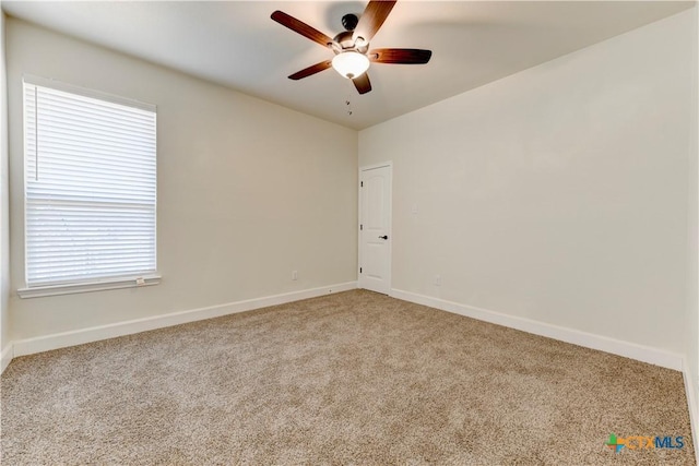 1040 Vista Dr, Salado, TX 76571 - carpeted spare room featuring baseboards, a ceiling fan, and plenty of natural light