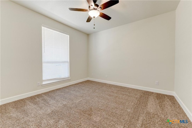 1040 Vista Dr, Salado, TX 76571 - spare room with light carpet, a ceiling fan, and baseboards