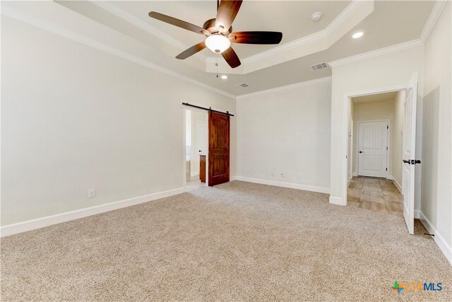 1040 Vista Dr, Salado, TX 76571 - unfurnished bedroom with recessed lighting, a tray ceiling, visible vents, ornamental molding, and light carpet