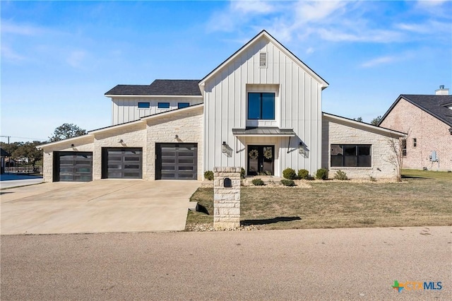 modern farmhouse style home featuring a garage