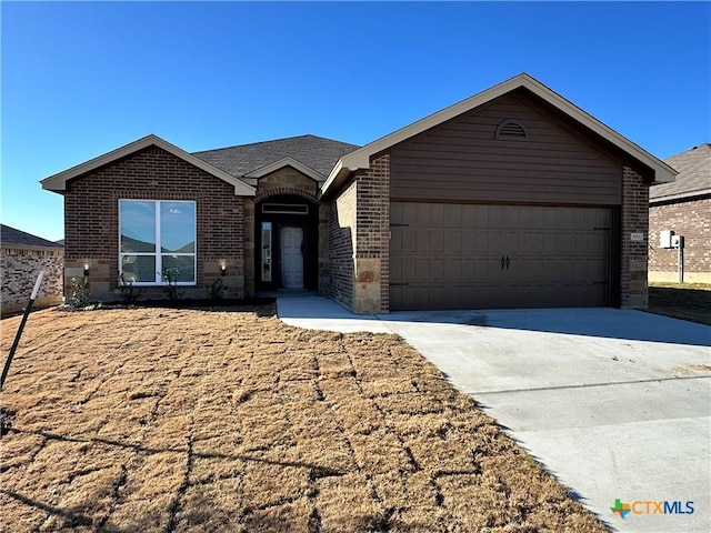 single story home with a garage