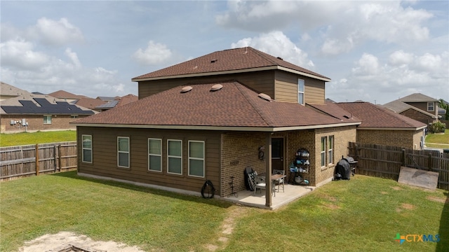 3700 Joyce Ln, Killeen, TX 76549 - rear view of property featuring a fenced backyard, a patio area, and brick siding